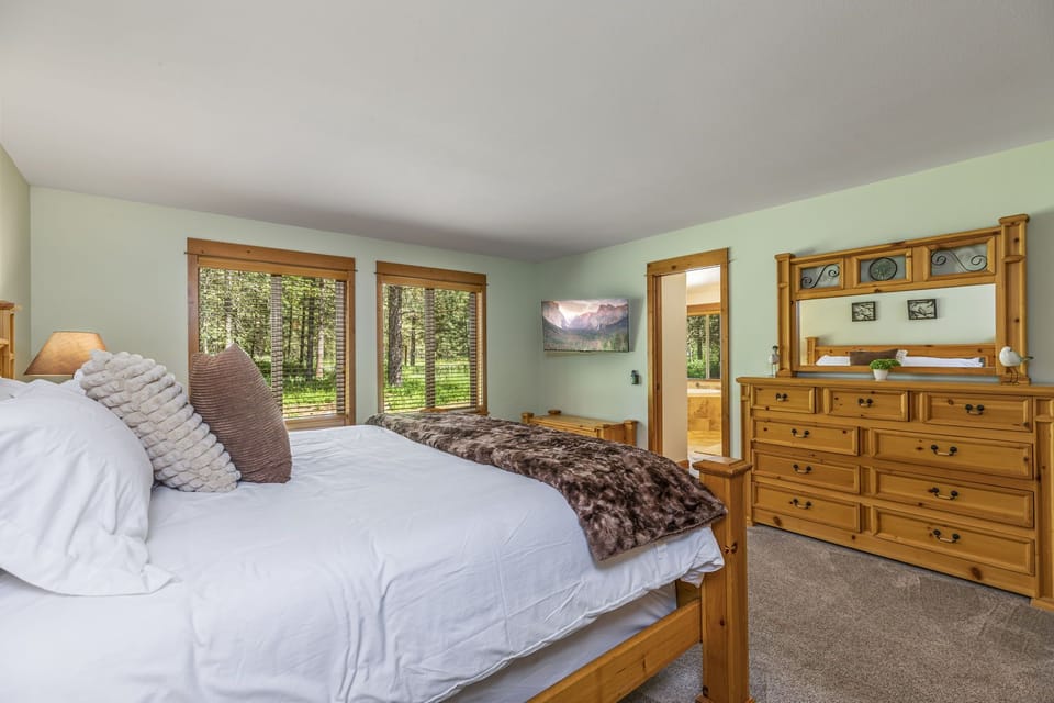 1st Bedroom Master Suite King Sized Bed Located on the Main Floor with an En Suite Bathroom