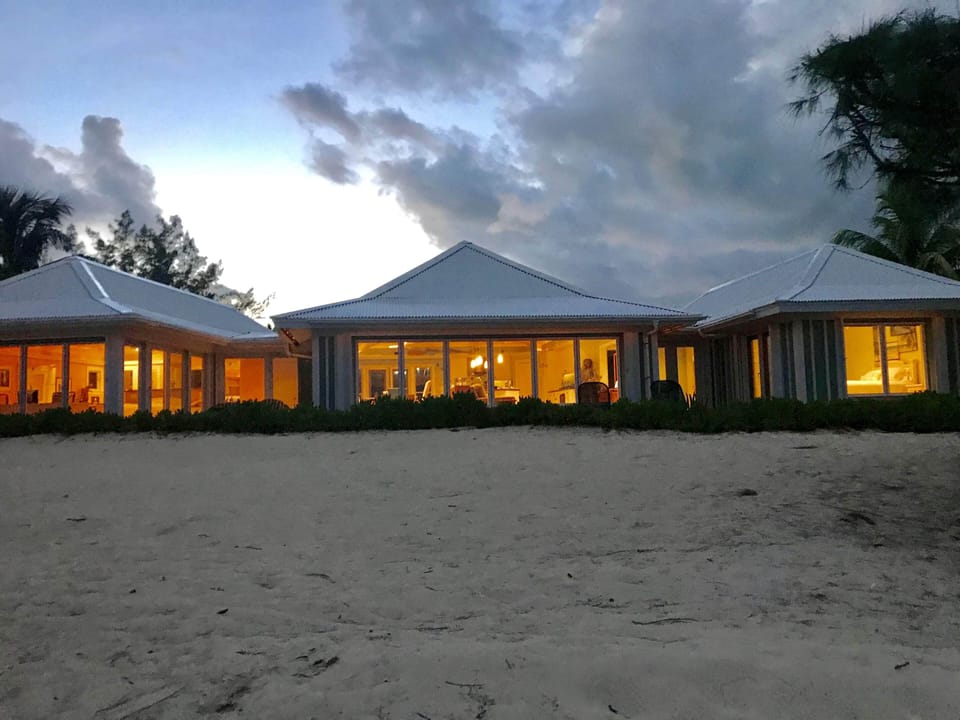 House at night from private beach