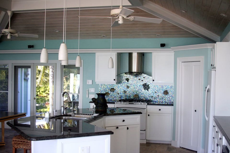 Left to right - front entry, stove area, pantry. 
Foreground - kitchen island