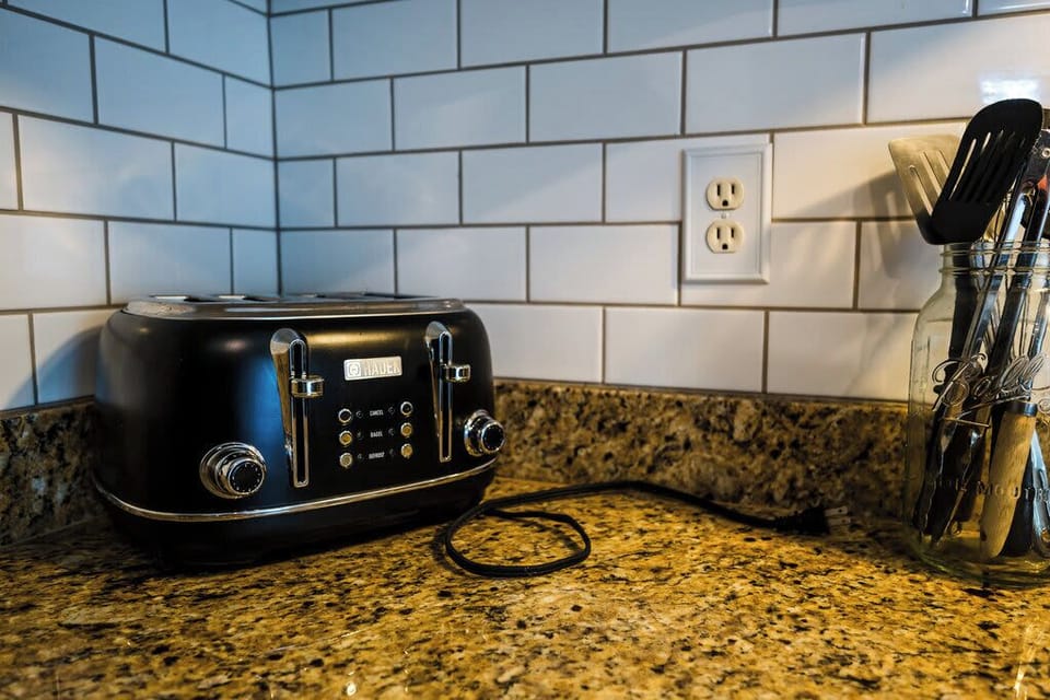 Modern appliances meet historic charm for a comfortable stay.
