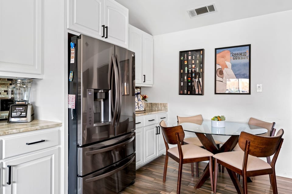 Gather with friends and family in our spacious dining area, designed to accommodate large groups and create a welcoming atmosphere for memorable meals.