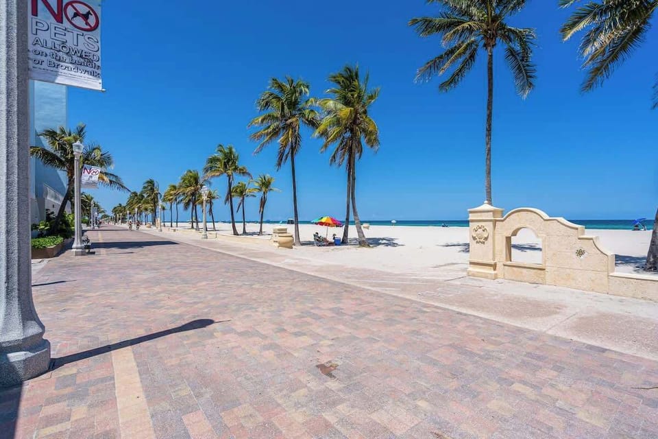 Stroll the palm-lined promenade just minutes from your stay—perfect for morning walks, beach days, and sunset views. Book your tropical escape now!

