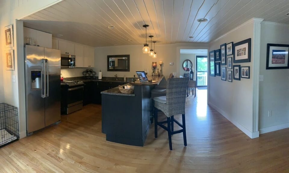 Pano of kitchen with microwave, toaster, keurig coffee maker, dishwasher