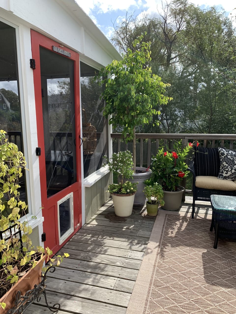 Entry to screened porch with 2 twins (trundle bed)