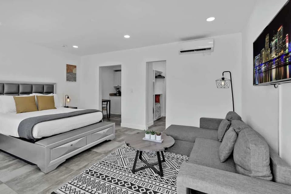 Stretch out and settle in—this stylish studio features a comfy bed, cozy sofa, smart TV, and kitchenette. Ideal for couples or solo travelers seeking a modern vacation rental with all the essentials.