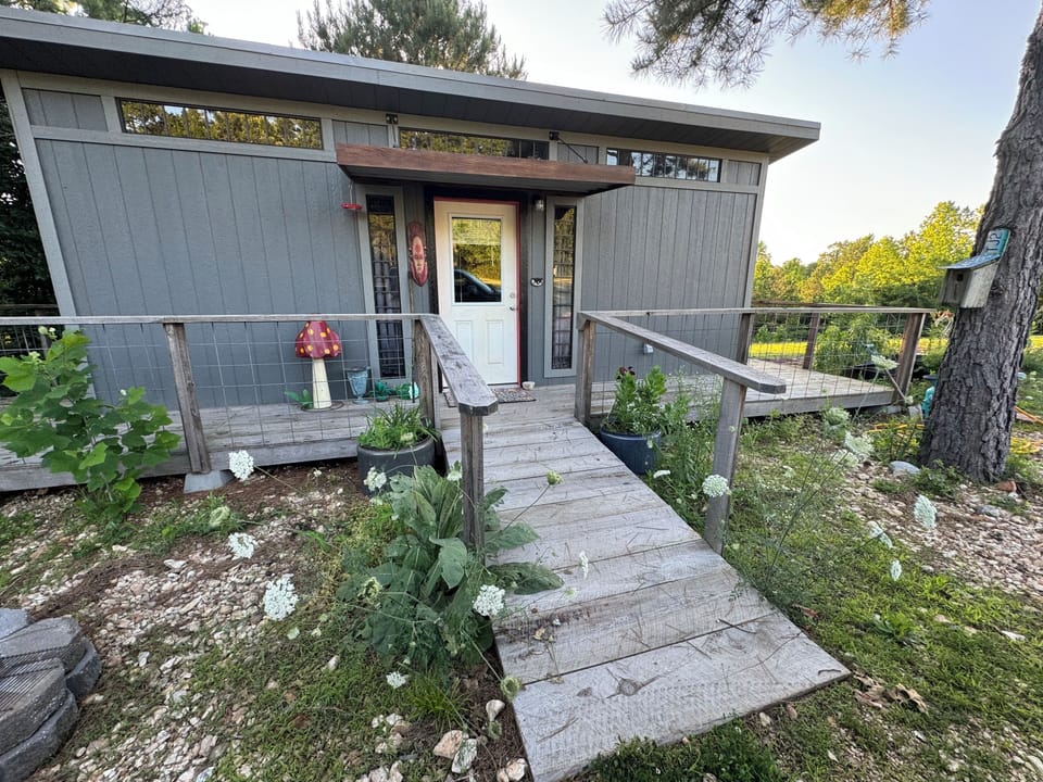 The Ridge Adventure Center framed with wildflowers Summer 2024 🩵