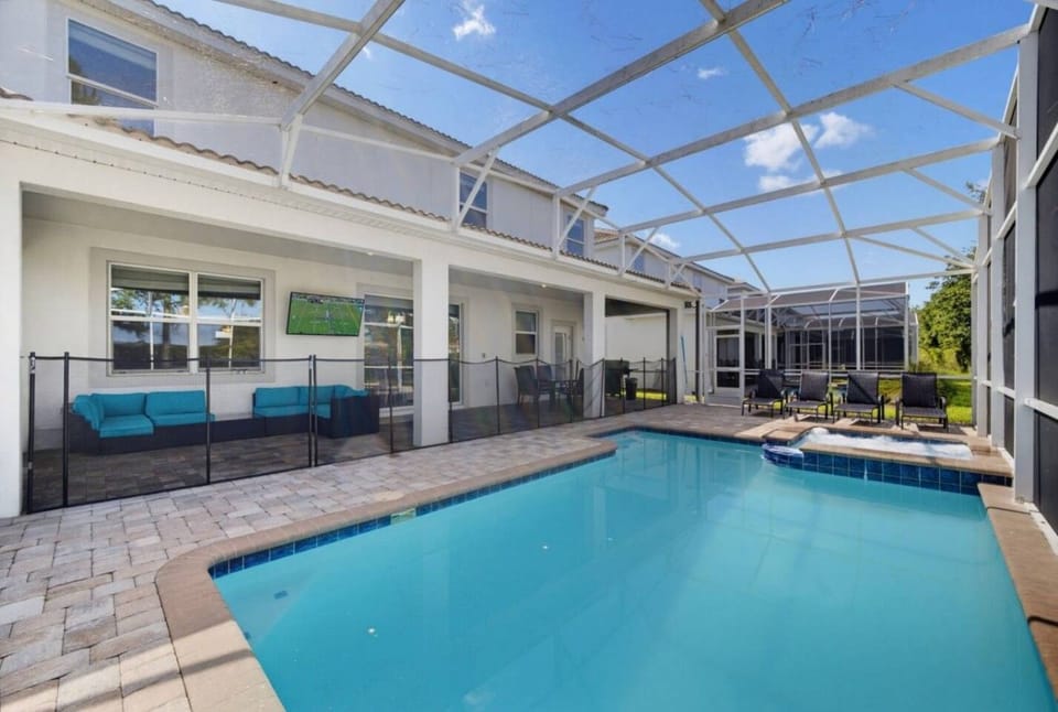 Outstanding 8BR Resort Pool Home Near Disney World Apartment in Osceola County