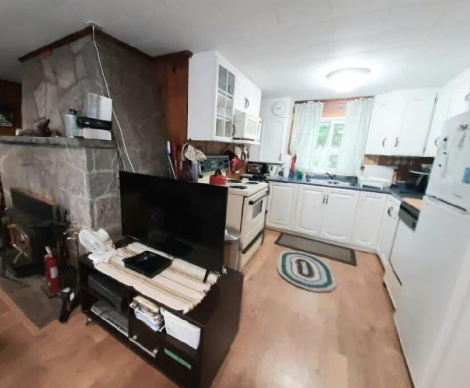 Our Lovely Stone Fireplace and Kitchen