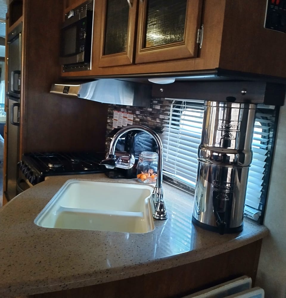 Gas Stove & Oven. Microwave, Refrigerator. Best Water filter on the market. 