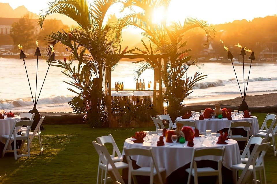 Toast the sunset with an unforgettable beachfront dinner setting.