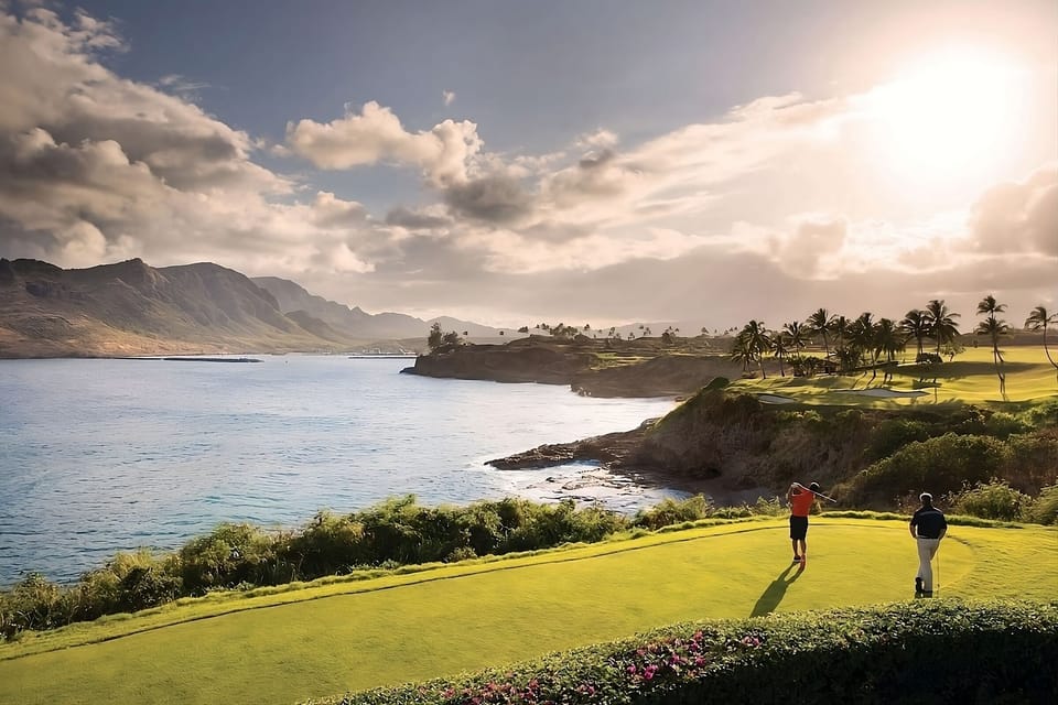 Play a seaside round as golden light washes the coastline.