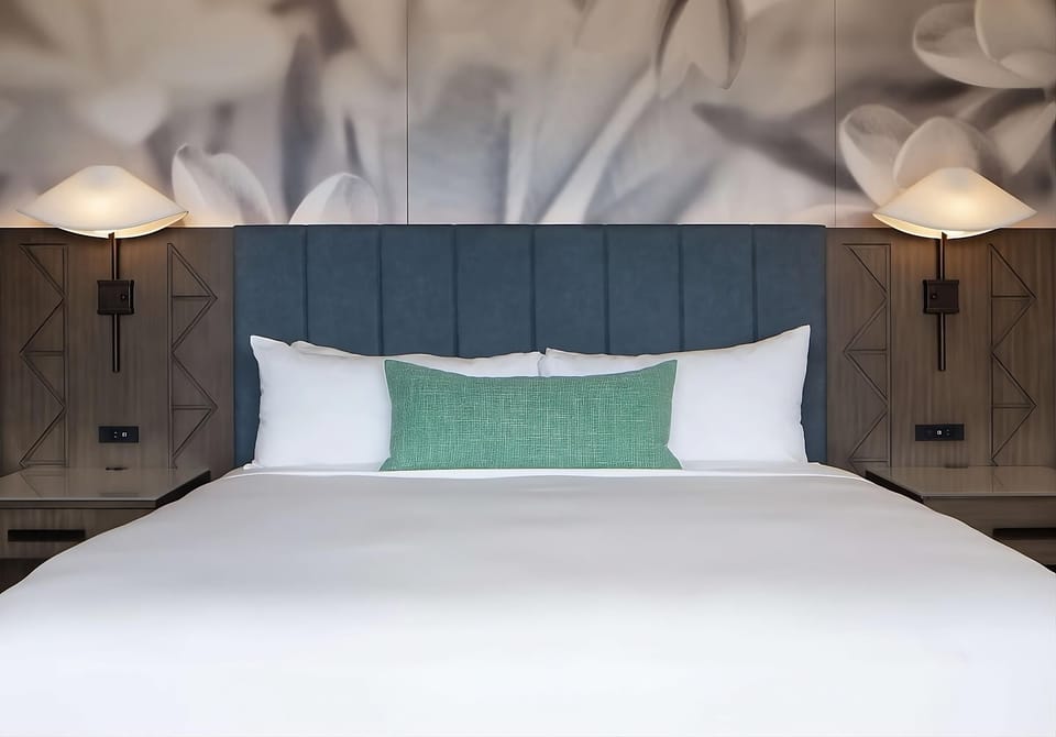Sink into plush bedding for a deeply restful night.