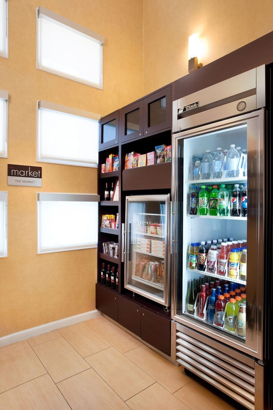 Grab snacks and essentials anytime at the convenient on-site market.