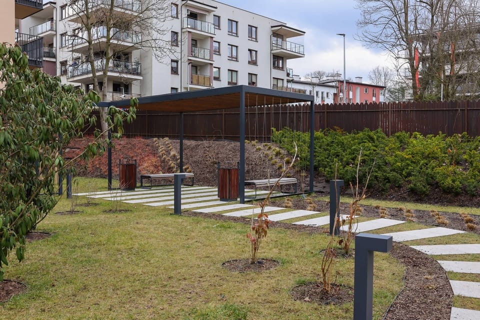 Greenery around the building. 