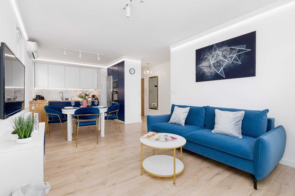Living room with a comfortable sofa and TV. 