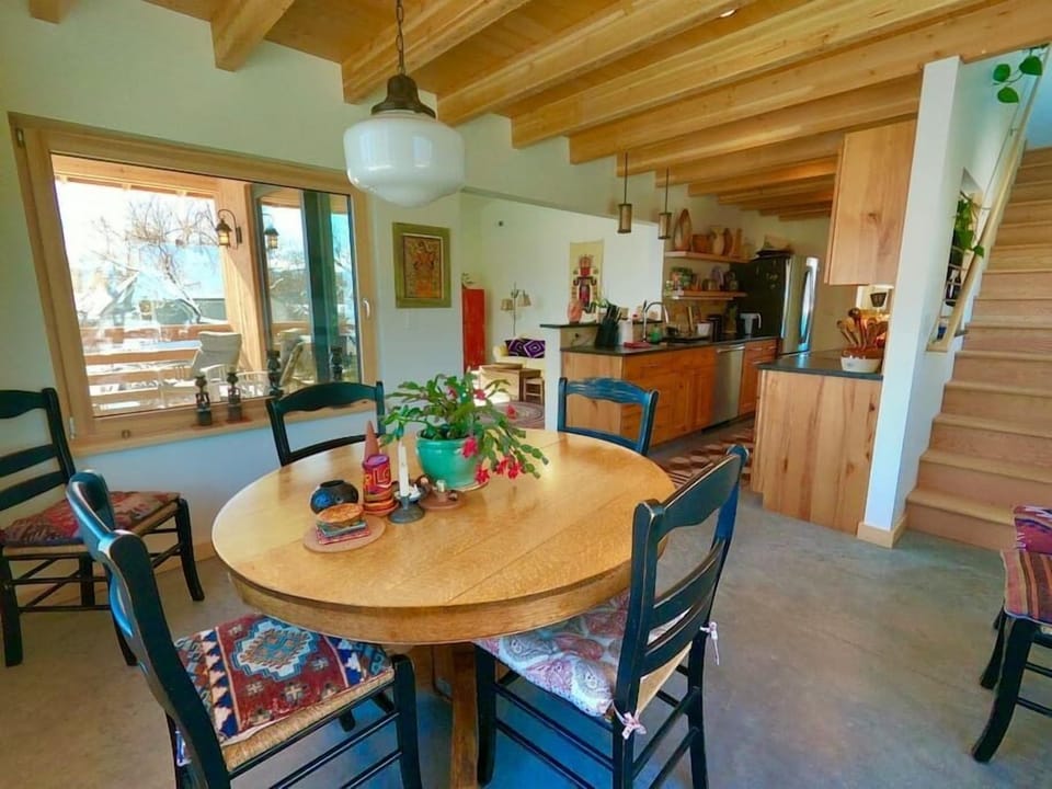The dining area and stairs to the third floor. 