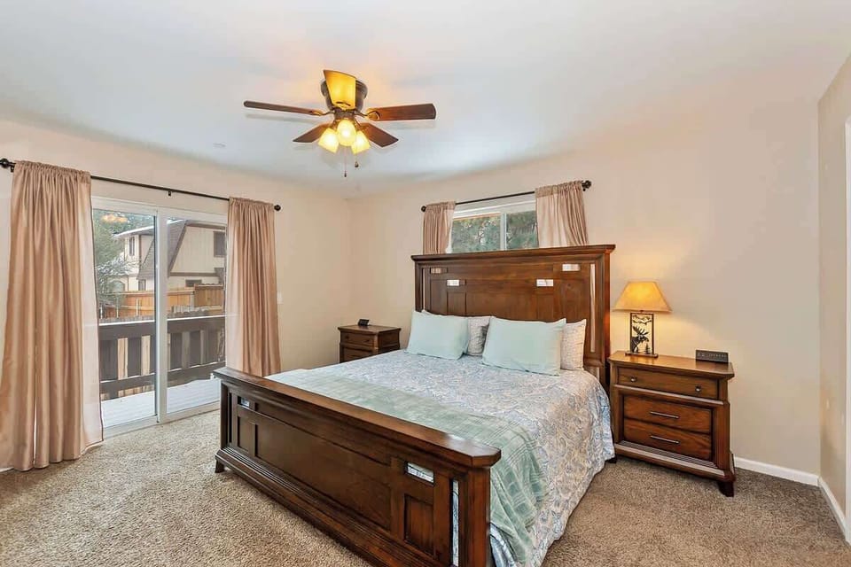 Main bedroom with sliding door for deck access 
