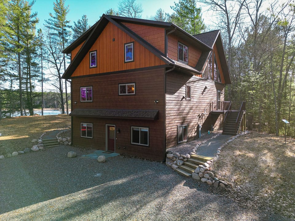 Exterior - Lower Level Entrance from Parking, Stairs Up to Main Level Entrance