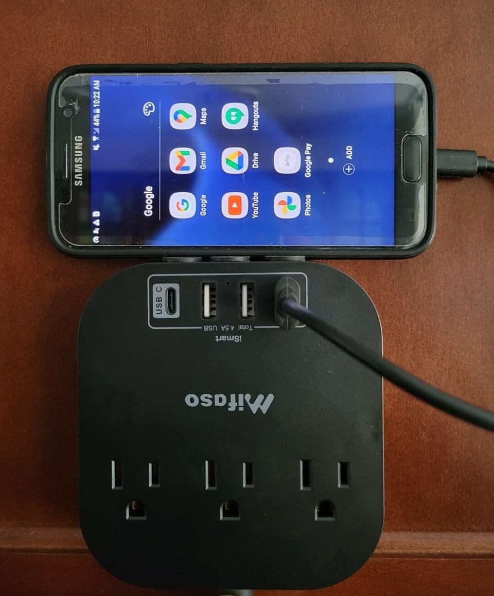 USB, Plug and USB-C charger right next to the bed