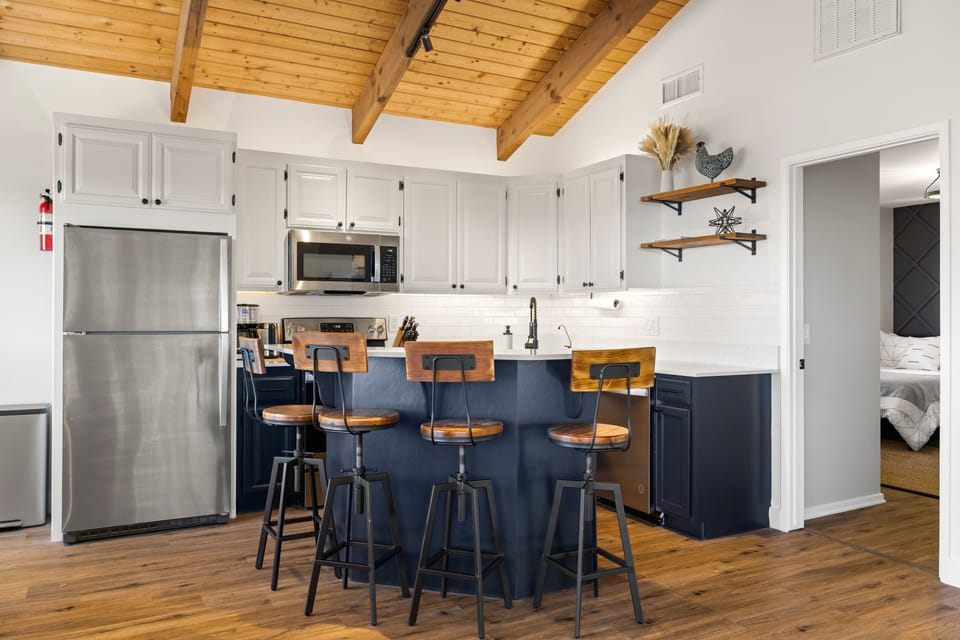Floating island and rustic bar stools