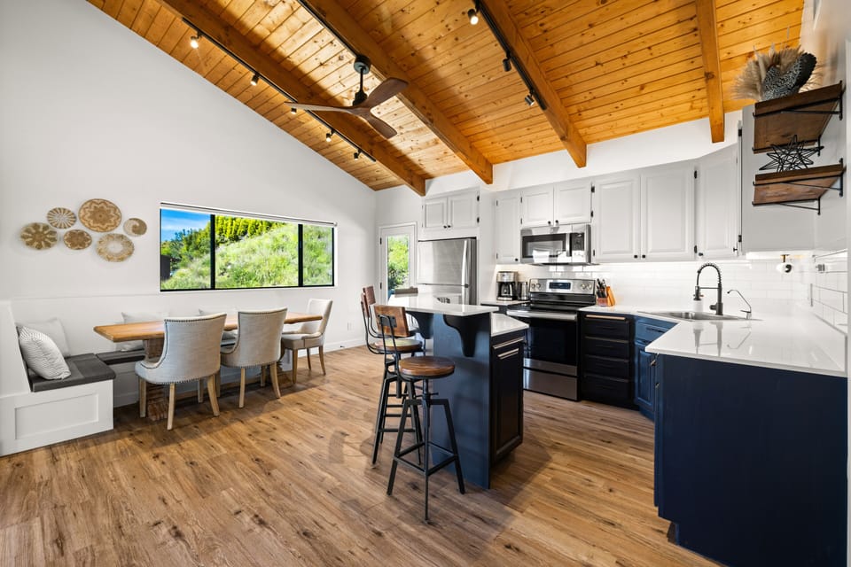Open floor plan kitchen with high vaulted ceilings 