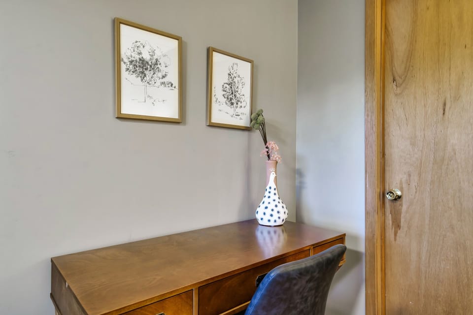 Accomplish a few tasks on the computer at our dedicated workspace, then get back to your vacation.