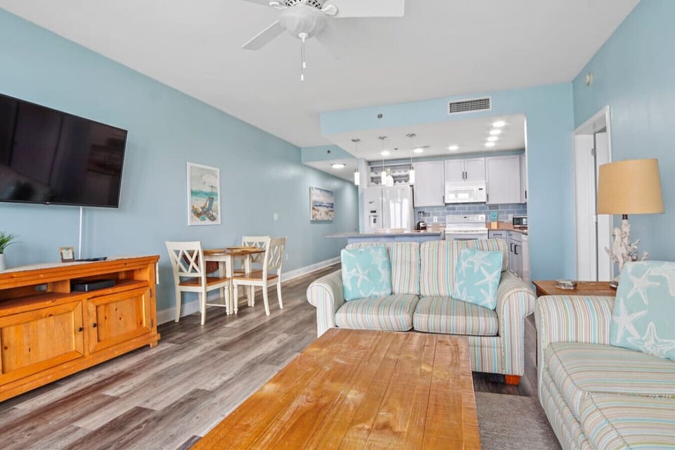 Living Area with Ocean Views, Flat Screen TV, Sleeper Sofa and Private Balcony Access