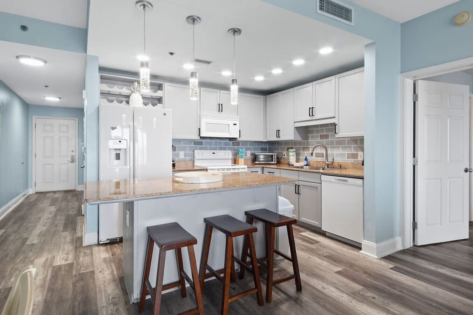 Fully Stocked Kitchen with Ocean Views and Island Bar Seating
