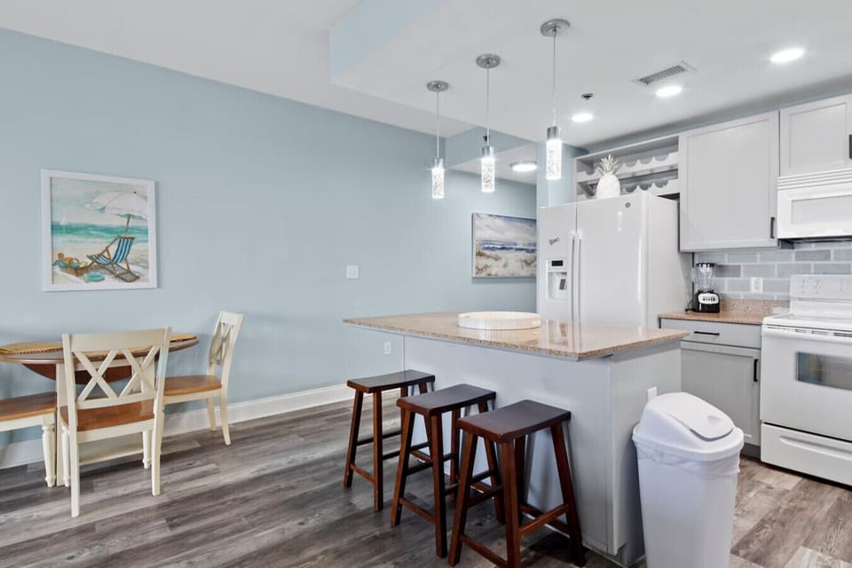 Fully Stocked Kitchen with Ocean Views and Island Bar Seating