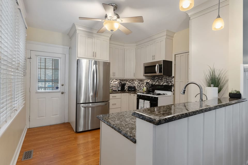 Our recently renovated kitchen is fully stocked with cooking essentials.