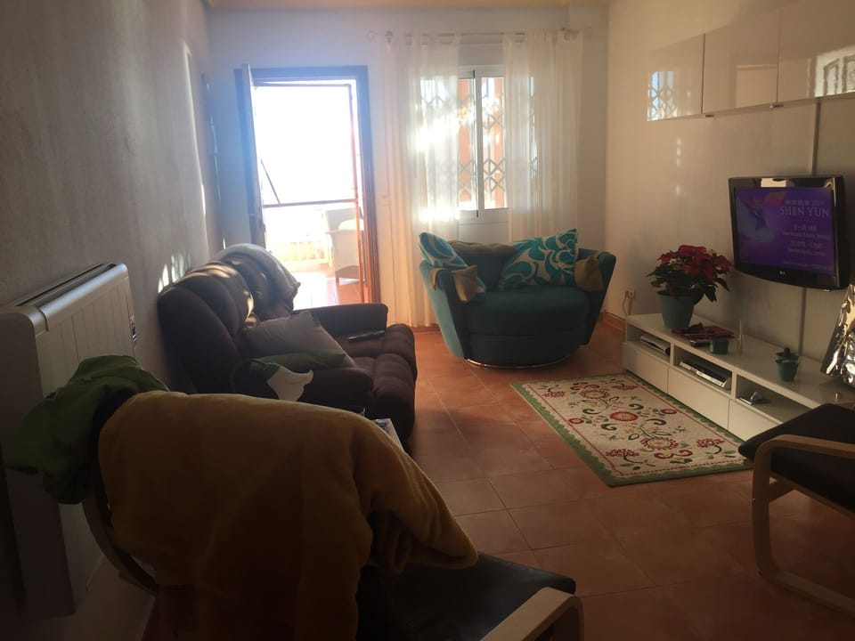Living area with sofa bed and room for storage 
50inch TV fire-stick, Netflix 