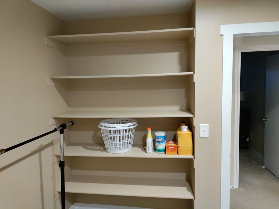 Laundry Room with storage and washer and dryer.