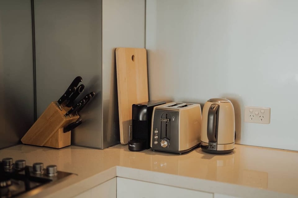 Start your day off right with a hot breakfast in this well-equipped kitchen, complete with a toaster, kettle, and all the essentials.