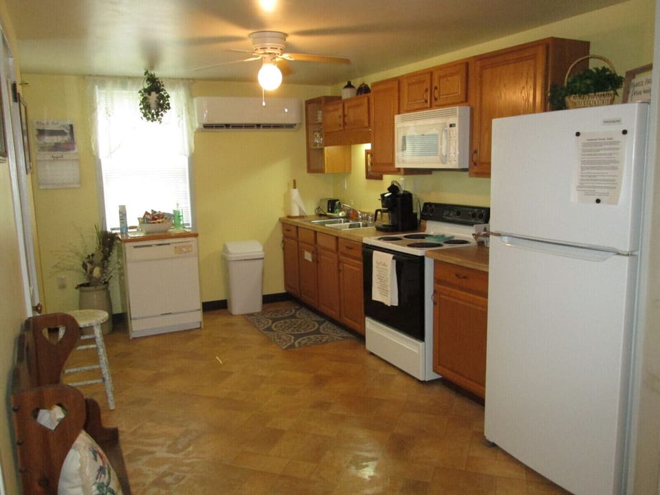 View from dining room area looking into kitchen area