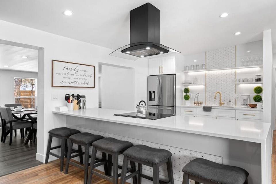 Enjoy bar seating that makes it easy to socialize while preparing meals