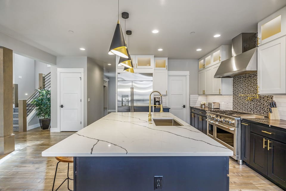 Kitchen – Stainless Appliances + Island for Easy Meal Prep