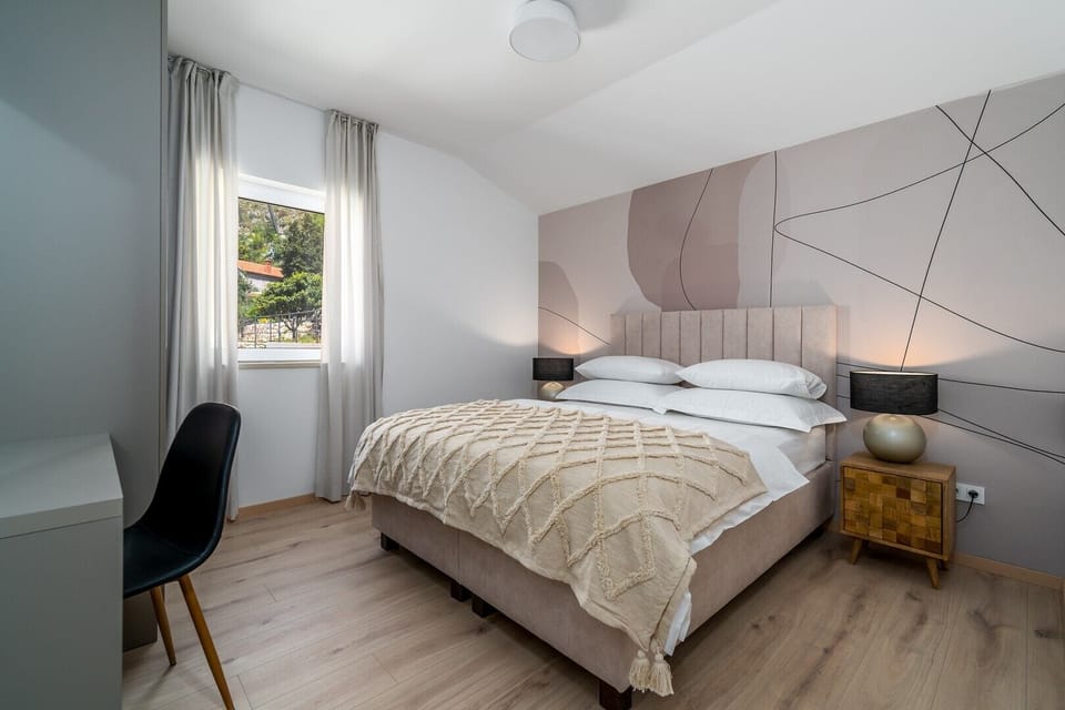 A Bedroom No2 (12sqm) with queen size bed 160cm x 200cm, A/C.