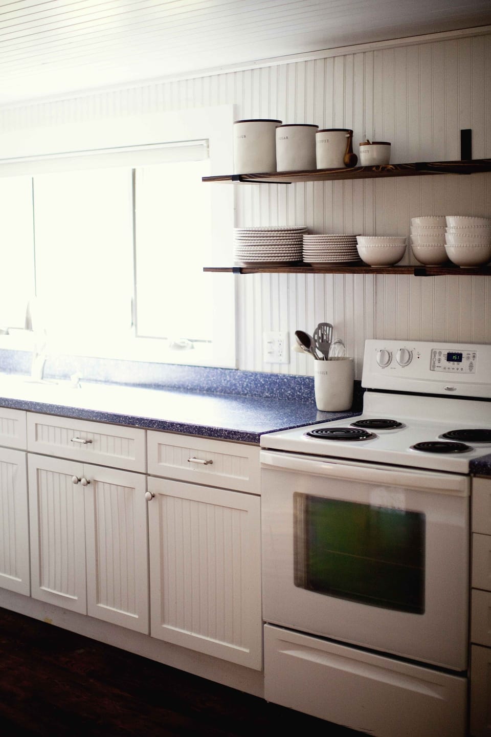 Cozy kitchen fully stocked with kitchen essentials.