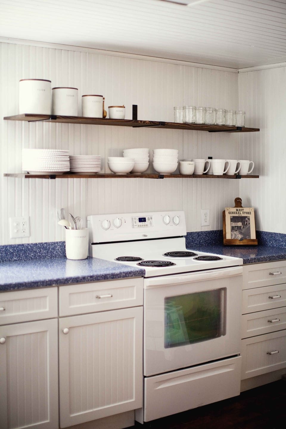 Cozy kitchen fully stocked with kitchen essentials.