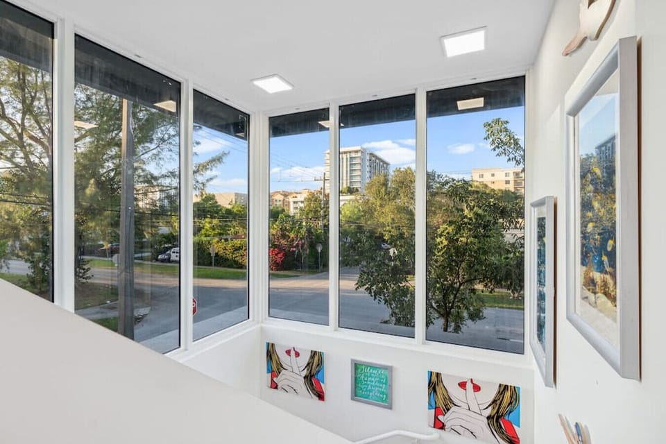 Our scenic view from the second floor going down. Walking distance to Coral Gables.