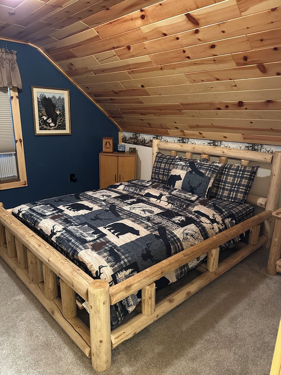 Bedroom up stairs with queen bed