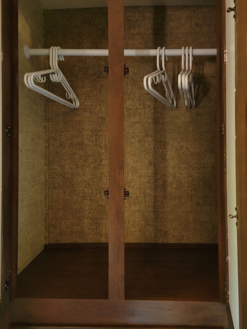 Lots of room to hang your clothes so you won't have to live out of your suitcase