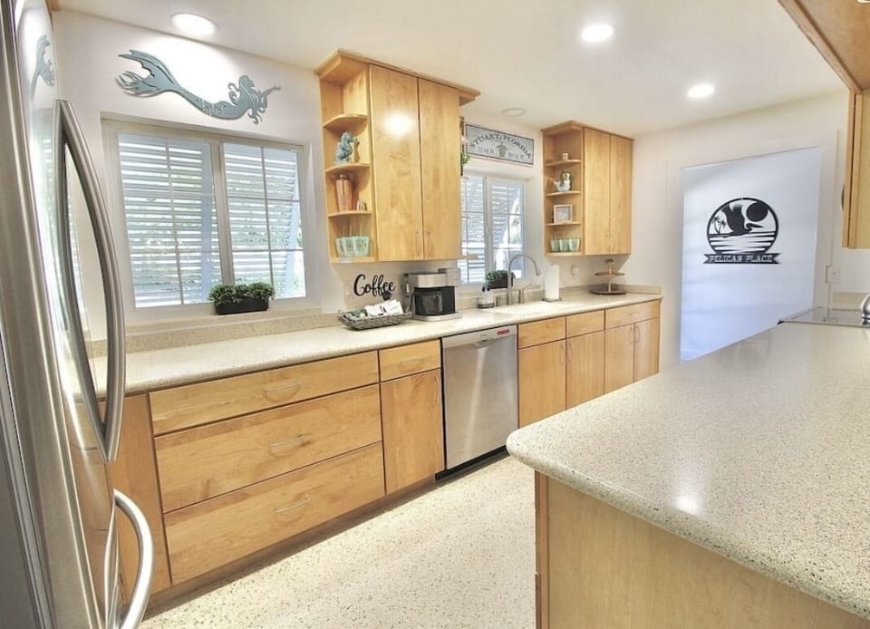 Spacious fully stocked kitchen to entertain and prepare meals.