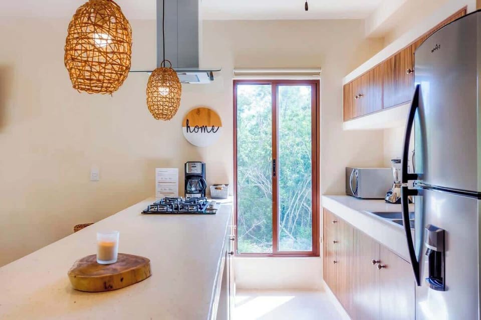 Quality appliances & essentials like a coffee maker, microwave & a blender!