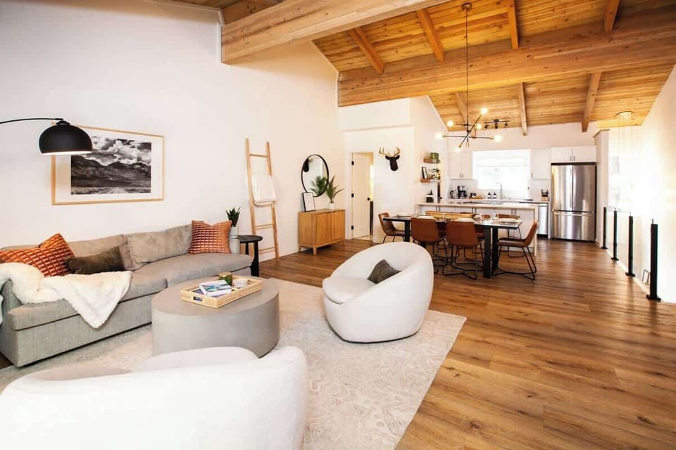 Welcome to our bright and comfortable open-concept living room and kitchen!