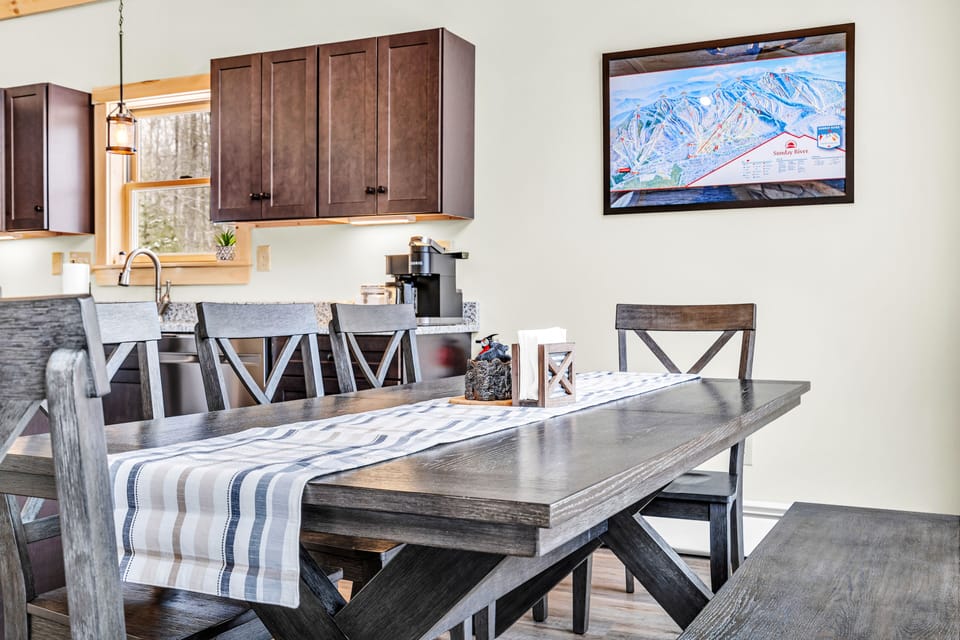 Gather around a spacious dining table for meals, games, and great conversations.