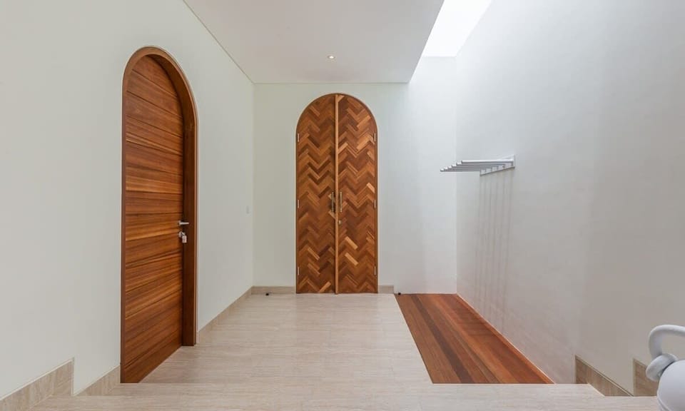 Entrance and surfboard rack