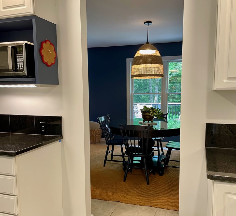 Looking into the dining room and through to the front porch