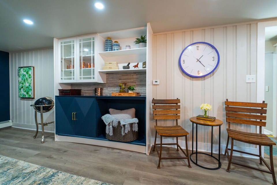 Downstairs Living Room and Dining Area with built in wall refrigerator