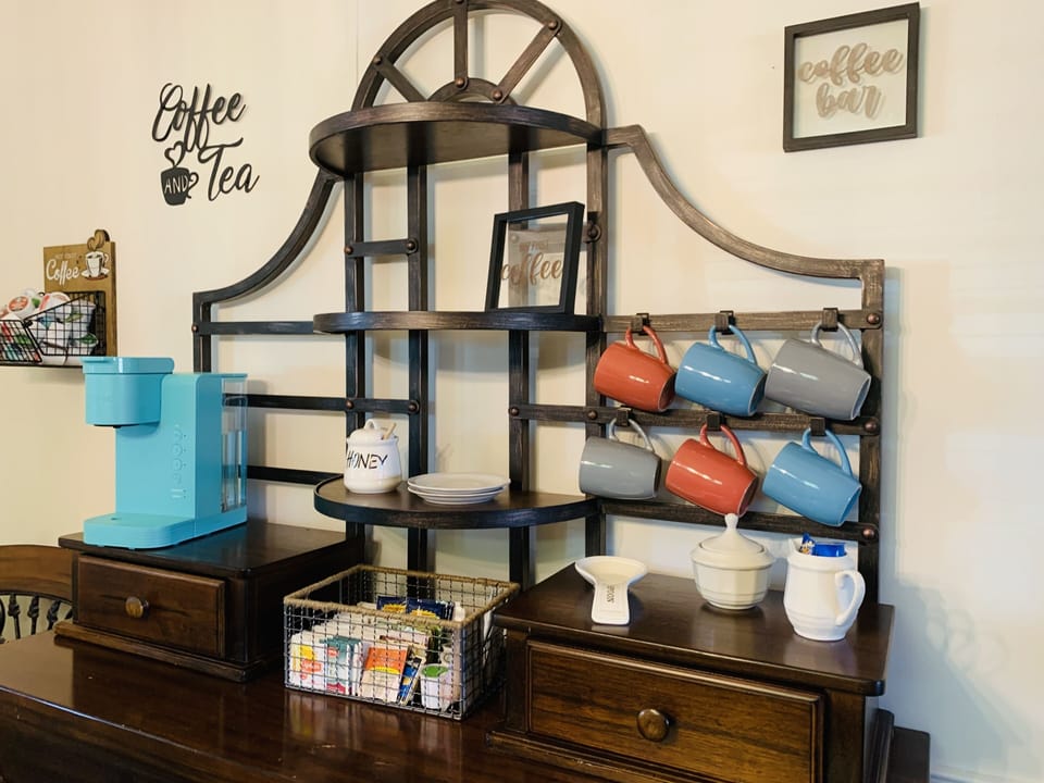Enjoy the coffee and tea bar. Comes with a  Keurig and a Mr. Coffee.